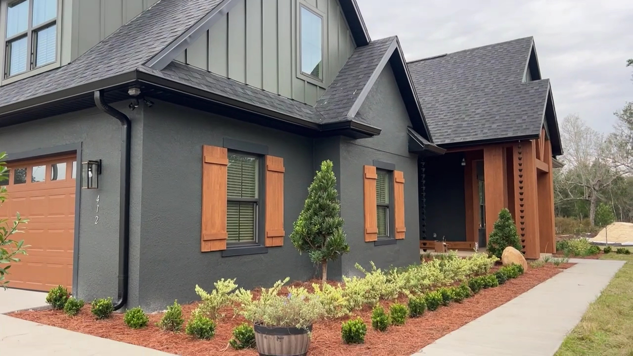 Home front with gutters and landscaping, Central Florida