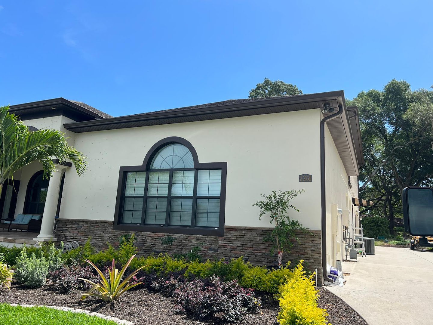 Landscaped home with seamless gutters, Central Florida