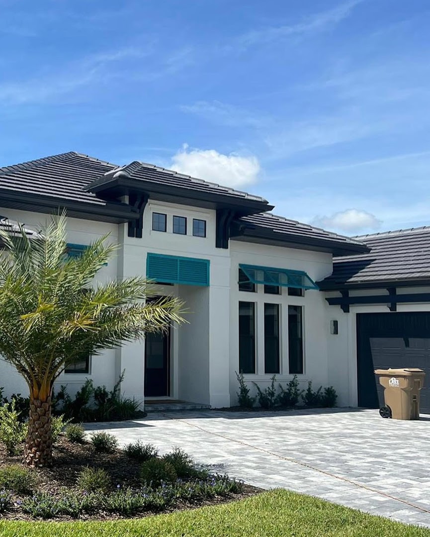 Two-tone modern home with gutters and downspouts, Central Florida